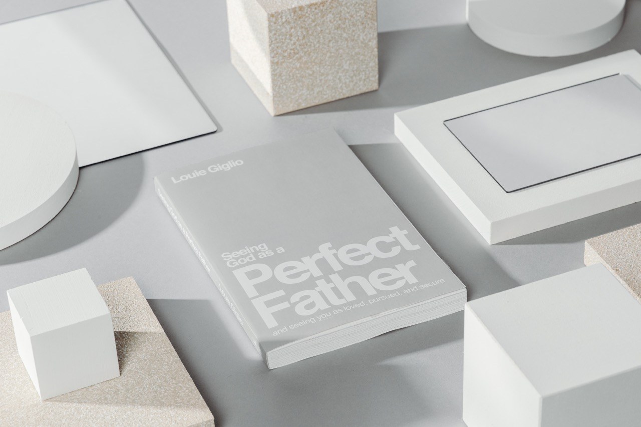 Book styled on a white tabletop set