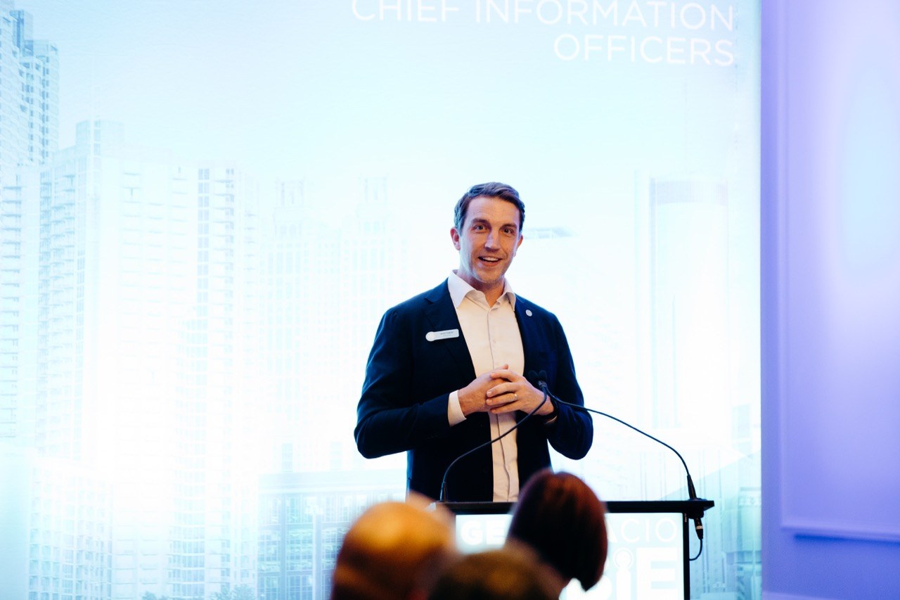 Speaker presenting at a podium