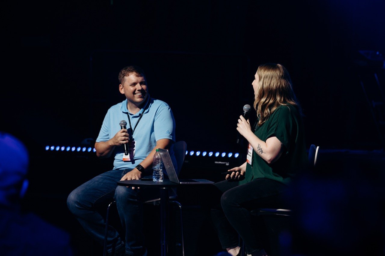 Fireside chat between two speakers