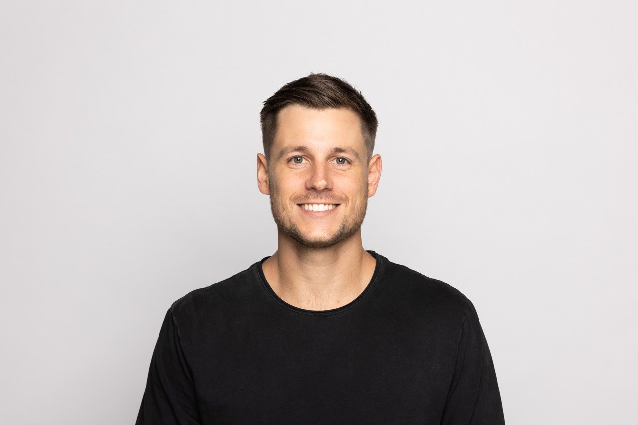Studio headshot of a man