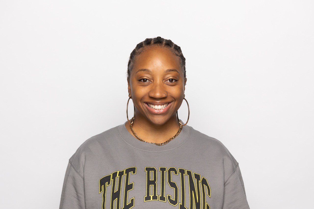 Studio headshot of a woman
